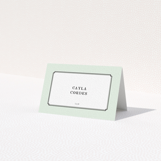 A place setting card called "Deco mint". It is an 85 x 55mm card in a landscape orientation. "Deco mint" is available as a folded card, with tones of green and white.