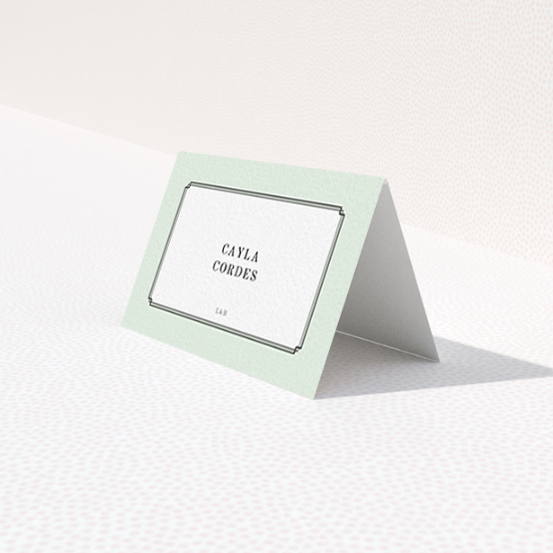 A place setting card called "Deco mint". It is an 85 x 55mm card in a landscape orientation. "Deco mint" is available as a folded card, with tones of green and white.