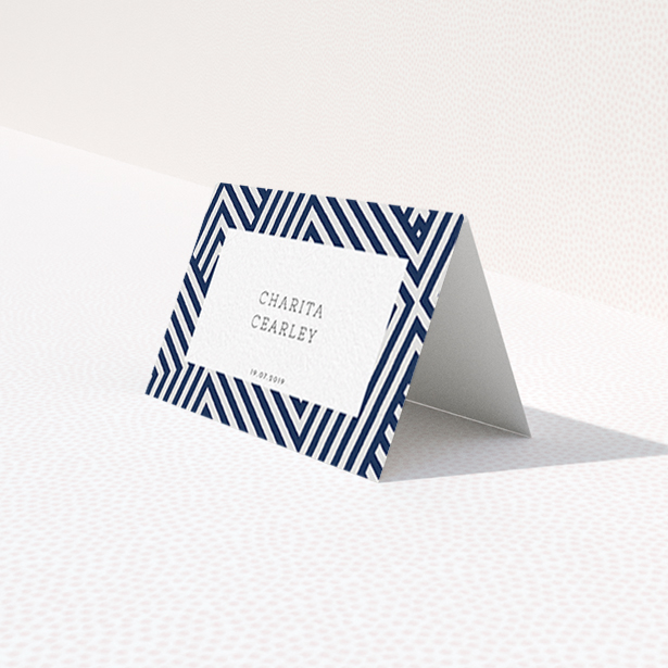 A place setting card called "Diamond scratch". It is an 85 x 55mm card in a landscape orientation. "Diamond scratch" is available as a folded card, with tones of navy blue and white.