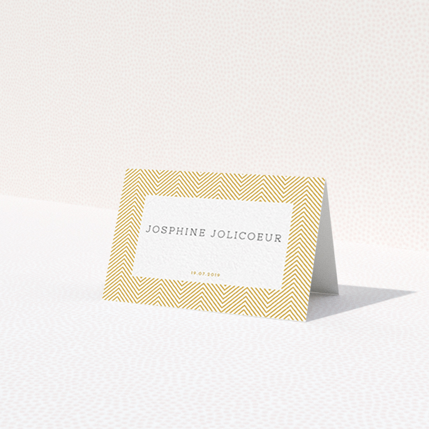 A place setting card template titled "Golden Lines". It is an 85 x 55mm card in a landscape orientation. "Golden Lines" is available as a folded card, with tones of gold and white.