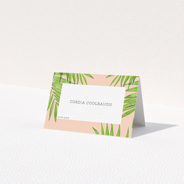 A place setting card design called "In the courtyard". It is an 85 x 55mm card in a landscape orientation. "In the courtyard" is available as a folded card, with tones of green and pink.