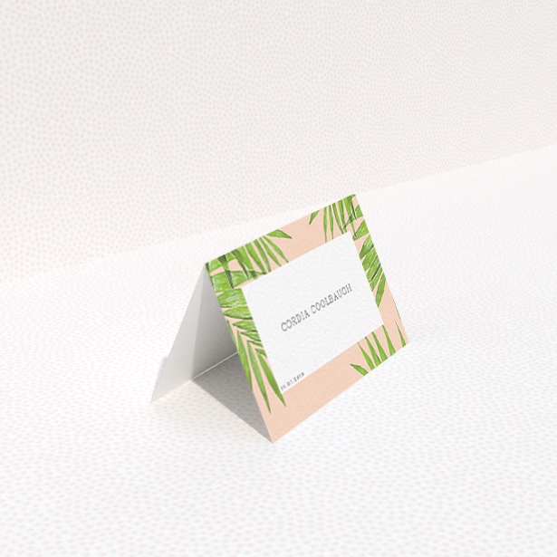 A place setting card design called "In the courtyard". It is an 85 x 55mm card in a landscape orientation. "In the courtyard" is available as a folded card, with tones of green and pink.