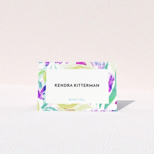 Place Setting Card Design - "Neon Florals" A place setting card design titled "Neon Florals". It is an 85 x 55mm card in a landscape orientation. "Neon Florals" is available as a folded card, with tones of white, green and pink.