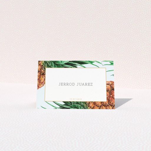 Place Setting Card Design - "Pineapples falling" A place setting card called "Pineapples falling". It is an 85 x 55mm card in a landscape orientation. "Pineapples falling" is available as a folded card, with tones of green, green and brown.