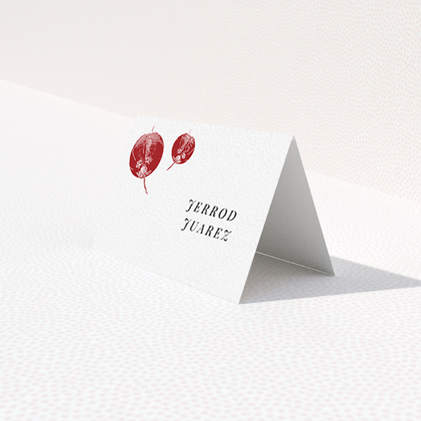 A place setting card called "Shanghai Nights". It is an 85 x 55mm card in a landscape orientation. "Shanghai Nights" is available as a folded card, with tones of red and white.