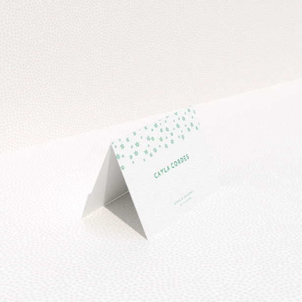 A place setting card design named "Stars at Night". It is an 85 x 55mm card in a landscape orientation. "Stars at Night" is available as a folded card, with tones of green and white.