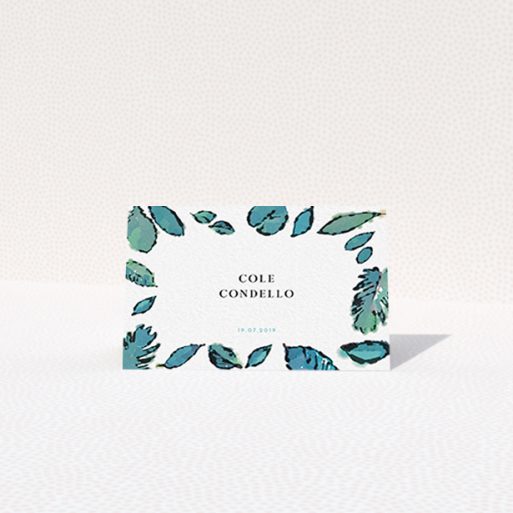 A place setting card called "Woodland Ambush". It is an 85 x 55mm card in a landscape orientation. "Woodland Ambush" is available as a folded card, with tones of green and white.