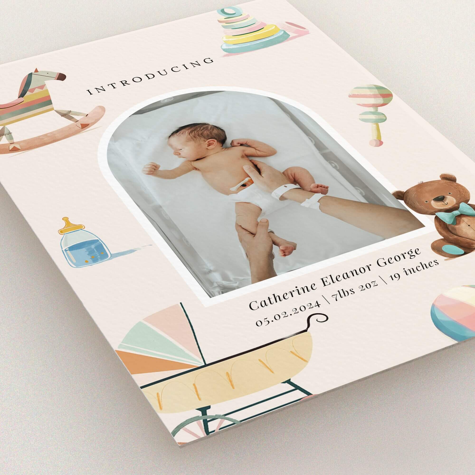 Colourful birth announcement card design with one photo of a newborn baby surrounded by playful illustrations.