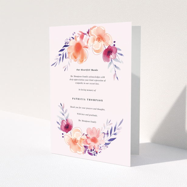Funeral thank you card with floral design featuring placeholder text and two photos.