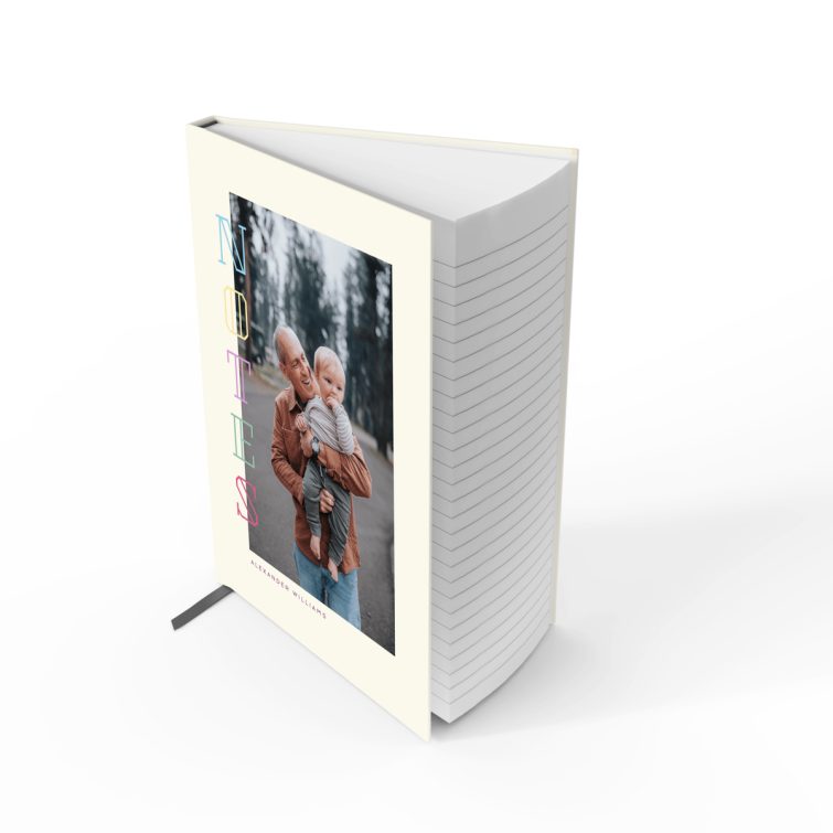 Portrait notebook cover design with colourful vertical text and one photo on the front cover.