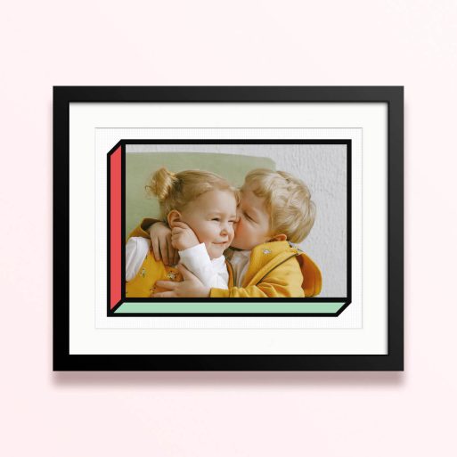 Framed and mounted photo print displaying a colourful design with one photo of young children hugging