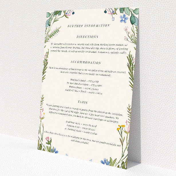 Richmond Meadow wedding information insert card featuring a captivating wreath of wildflowers and foliage, perfect for couples seeking a whimsical charm amidst the beauty of nature in their wedding stationery This is a view of the front