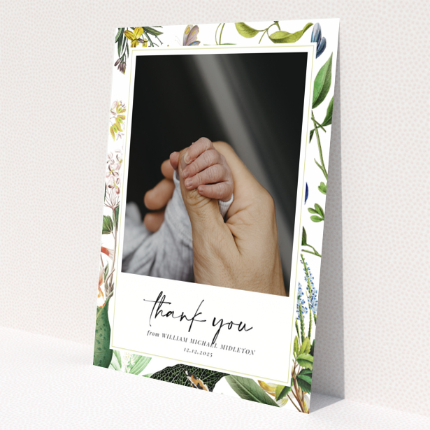 Baby thank you card with floral border and one photo of baby hand.
