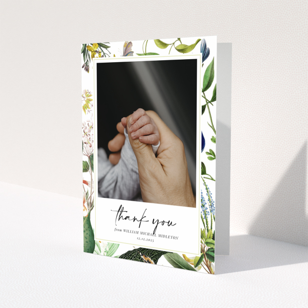 Baby thank you card with floral border and one photo of baby hand.