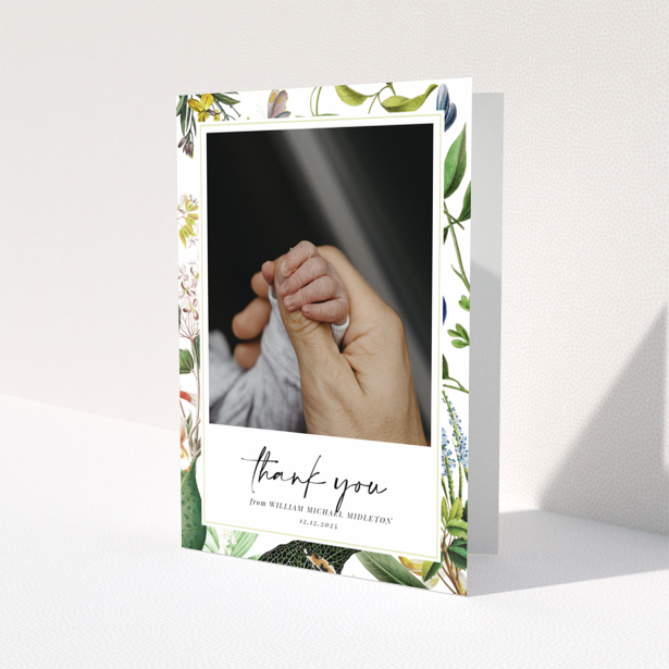 Baby thank you card with floral border and one photo of baby hand.