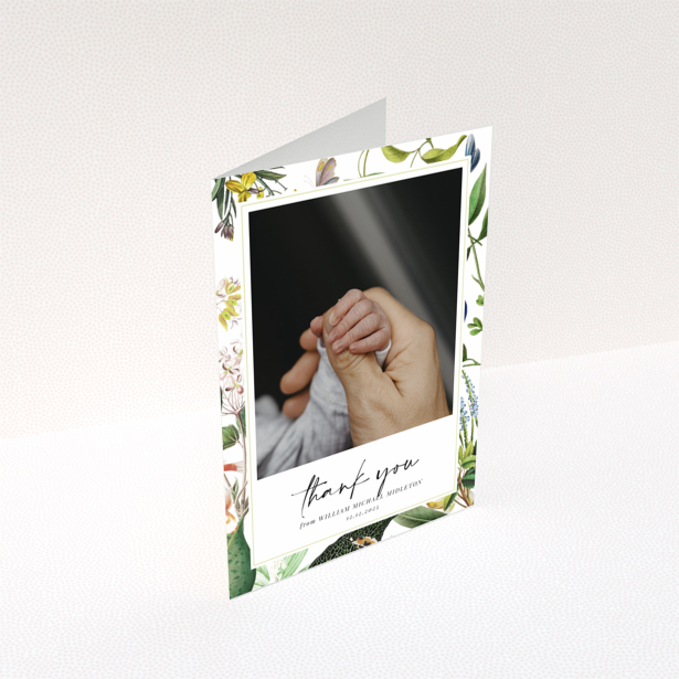 Baby thank you card with floral border and one photo of baby hand.