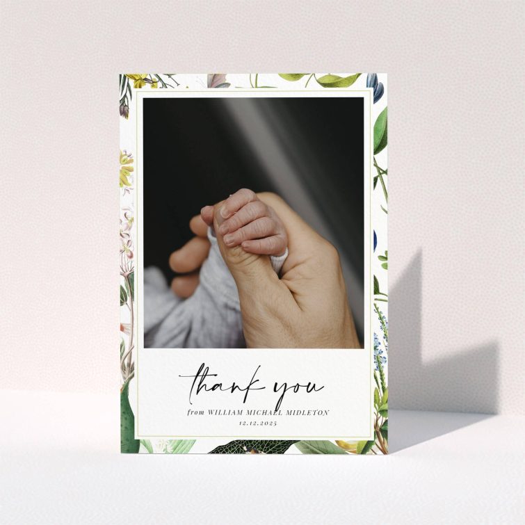 Baby thank you card with floral border and one photo of baby hand.