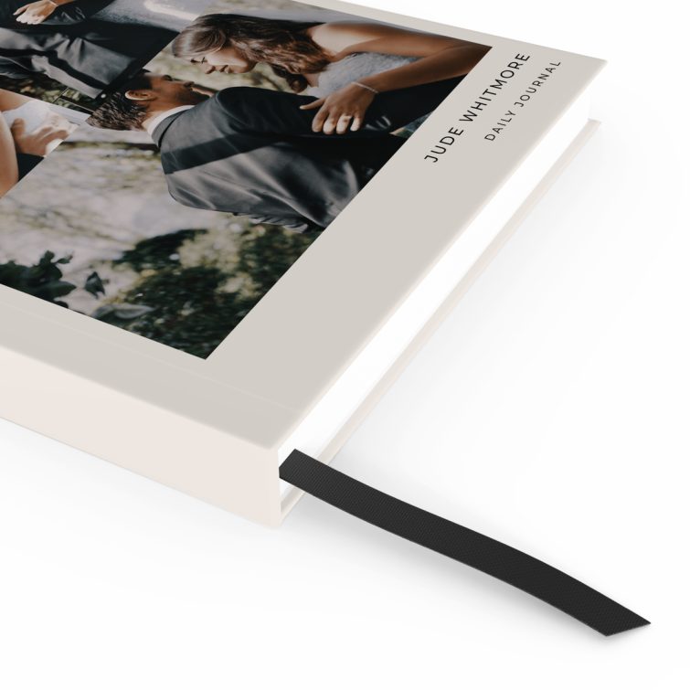 Elegant personalised portrait orientation wedding notebook design featuring three photos on the cover.