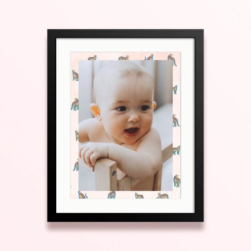 Framed and mounted photo print with dummy text featuring one photo of a baby in a decorative border