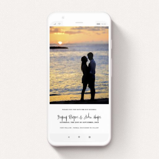 A save the date for whatsapp design called "A bit at the bottom". It is a smartphone screen sized card in a portrait orientation. It is a photographic save the date for whatsapp with room for 1 photo. "A bit at the bottom" is available as a flat card, with tones of black and white.