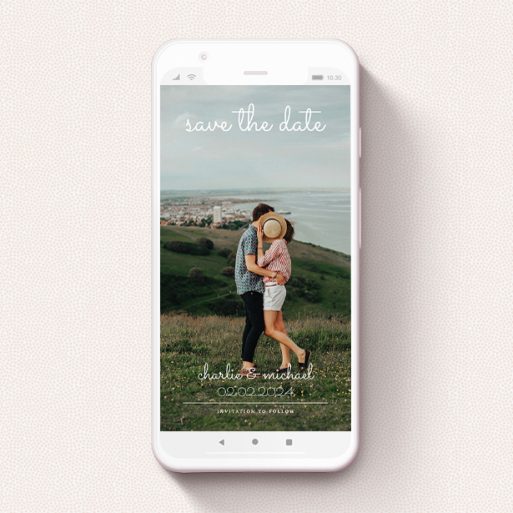 A save the date for whatsapp design titled "Date Saving Photo". It is a smartphone screen sized card in a portrait orientation. It is a photographic save the date for whatsapp with room for 1 photo. "Date Saving Photo" is available as a flat card, with mainly white colouring.