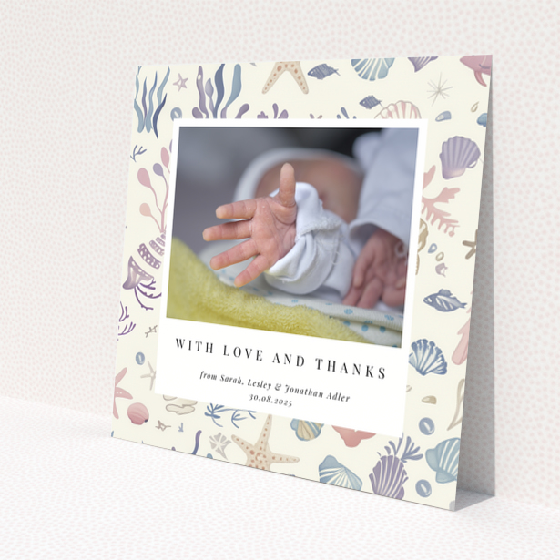 Baby thank you card with sea-themed design and one photo of a newborn's hand.