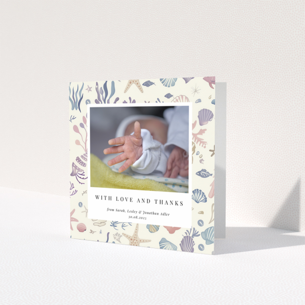 Baby thank you card with sea-themed design and one photo of a newborn's hand.