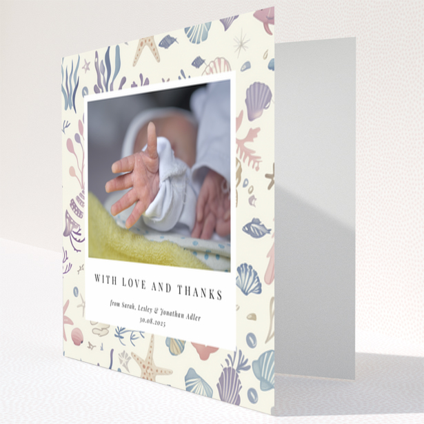 Baby thank you card with sea-themed design and one photo of a newborn's hand.