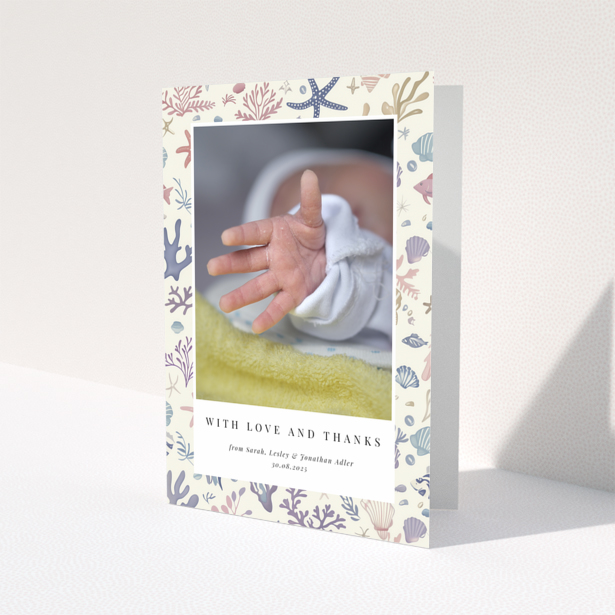 Baby thank you card with sea-themed design and one photo of a newborn's hand.