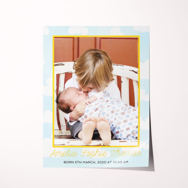 Experience the joy of parenthood with our 'In the Clouds' High-Resolution Silver Halide Poster. A unique and heartfelt way to cherish your precious memories.