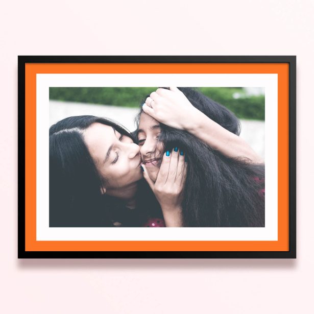 Simple framed prints designs featuring a photo of two people sharing a tender moment.