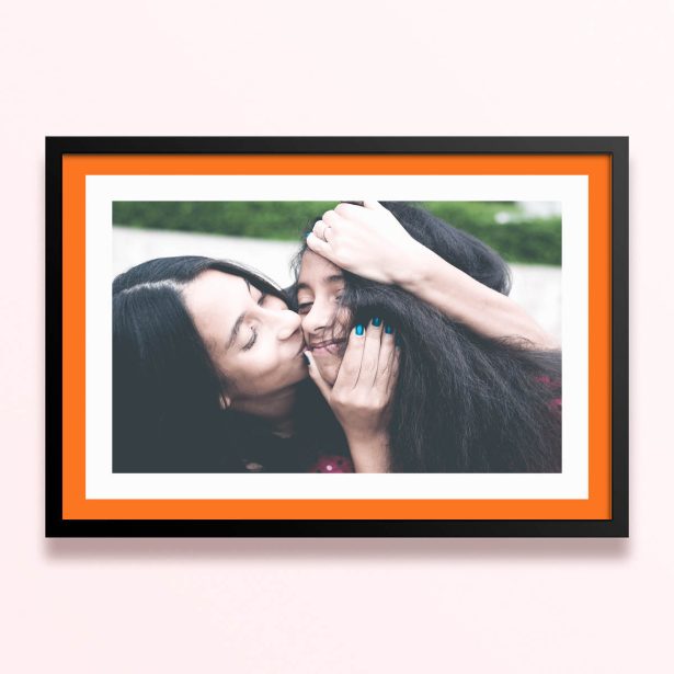 Simple framed prints designs featuring a photo of two people sharing a tender moment.