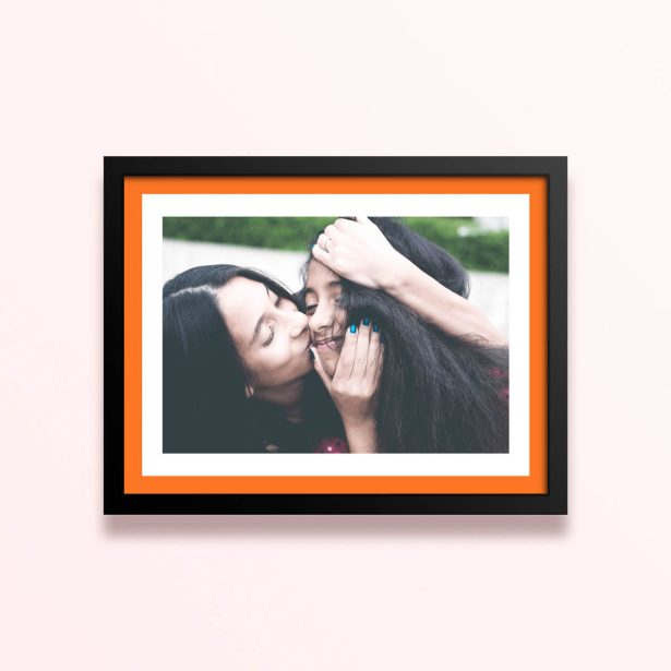 Simple framed prints designs featuring a photo of two people sharing a tender moment.