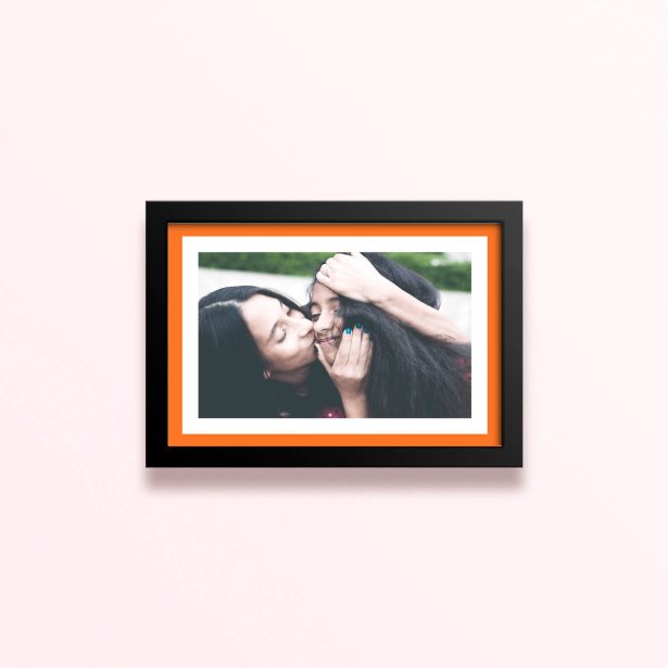Simple framed prints designs featuring a photo of two people sharing a tender moment.