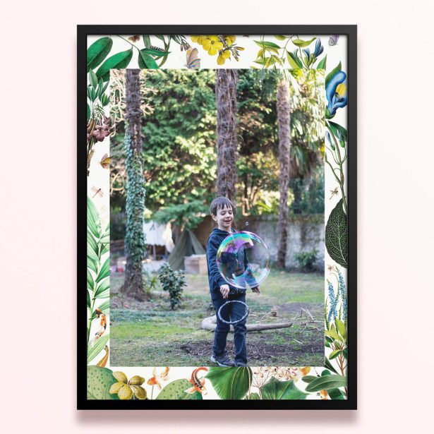 Simple framed print design with floral borders and one photo of a child playing outdoors