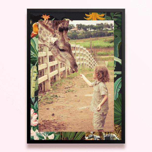 Simple framed prints design with one photo of a child feeding a giraffe, surrounded by a floral and jungle-themed border.
