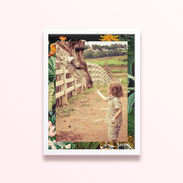 Simple framed prints design with one photo of a child feeding a giraffe, surrounded by a floral and jungle-themed border.