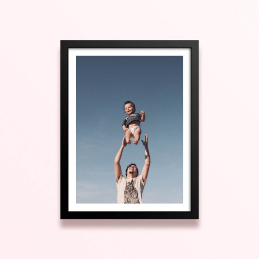 Simple framed prints designs with one photo of a person being lifted into the air