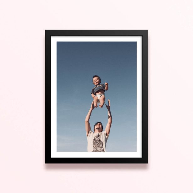 Simple framed prints designs with one photo of a person being lifted into the air