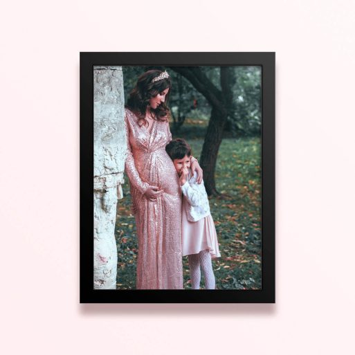 Simple framed prints designs featuring a woman in a long dress with crown and a child in a forest backdrop, one photo.