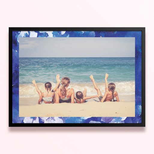 Simple framed prints designs with blue border and one photo of a family on the beach