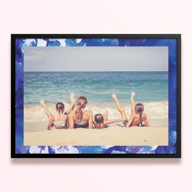 Simple framed prints designs with blue border and one photo of a family on the beach