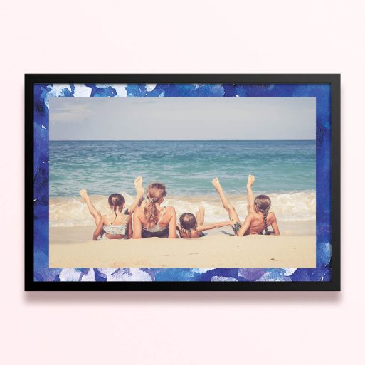 Simple framed prints designs with blue border and one photo of a family on the beach