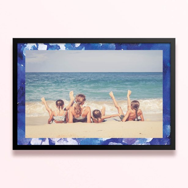 Simple framed prints designs with blue border and one photo of a family on the beach