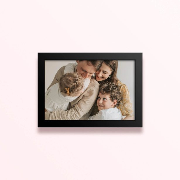 Simple framed prints designs with a family photo of four people hugging