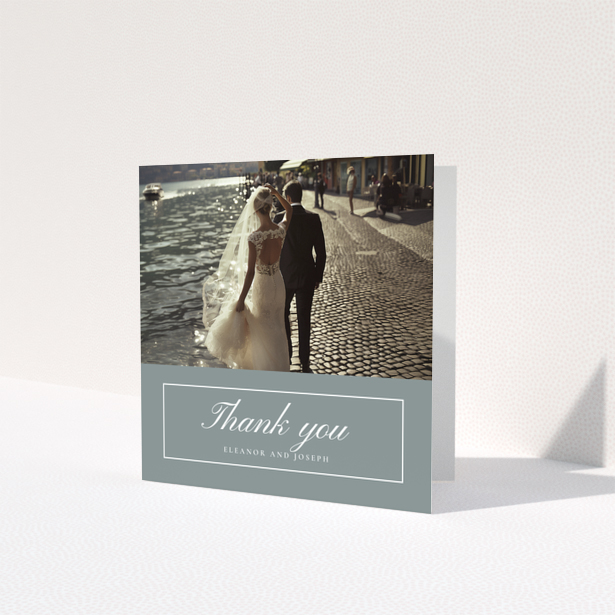 Wedding thank you card design with one photo featuring a bride and groom by the water.
