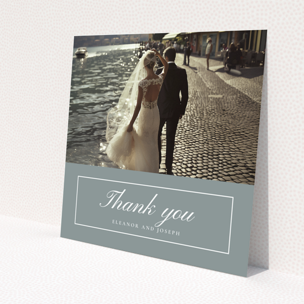 Wedding thank you card design with one photo featuring a bride and groom by the water.