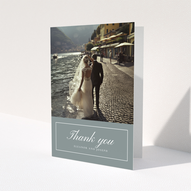 Wedding thank you card design with one photo featuring a bride and groom by the water.