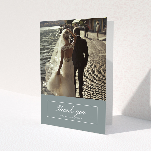 Wedding thank you card design with one photo featuring a bride and groom by the water.