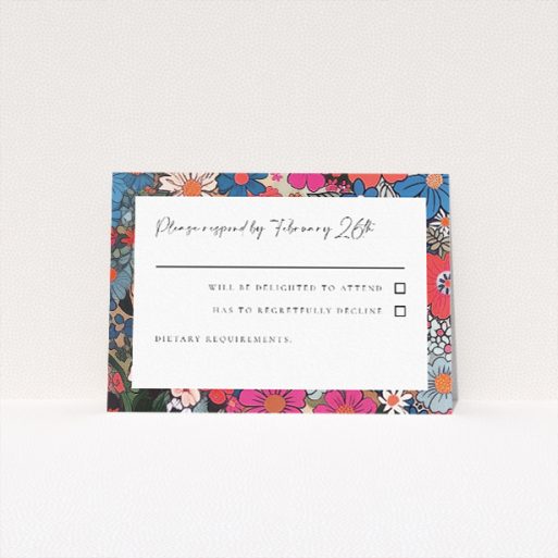 RSVP card template from the Soho Blossom suite, featuring vibrant floral design in deep pinks, blues, and purples, capturing the energetic spirit of Soho for couples seeking a lively and colourful celebration This is a view of the front